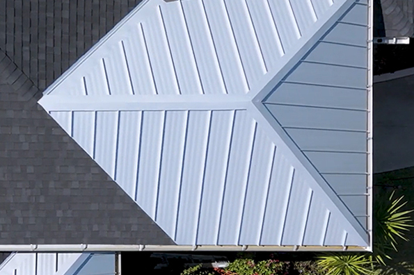 Aerial view of sustainable standing seam metal roof installed by Noland’s Roofing, showcasing modern eco-friendly roofing materials in Central Florida.